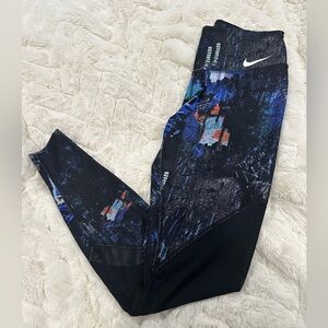 Gently used Nike XSmall black leggings with mesh detail
